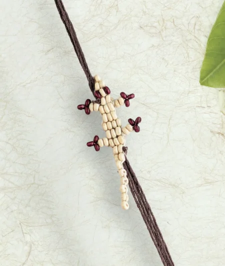 White Chhipkali Rakhi